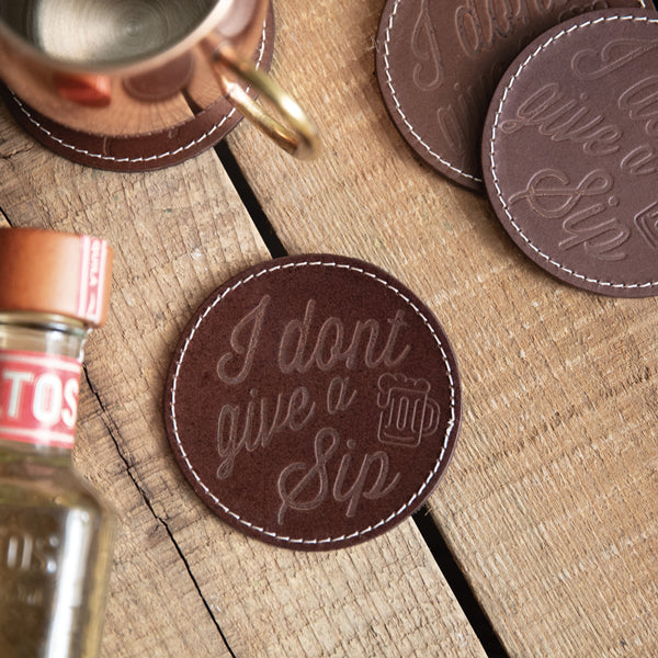 Set of Four Leather Coasters - I Don't Give A Sip